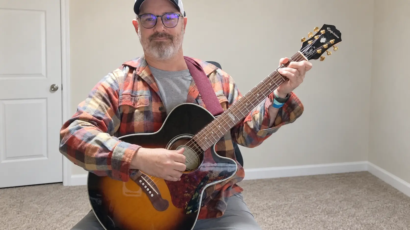Jeremiah Williams demonstrating guitar during an online lesson